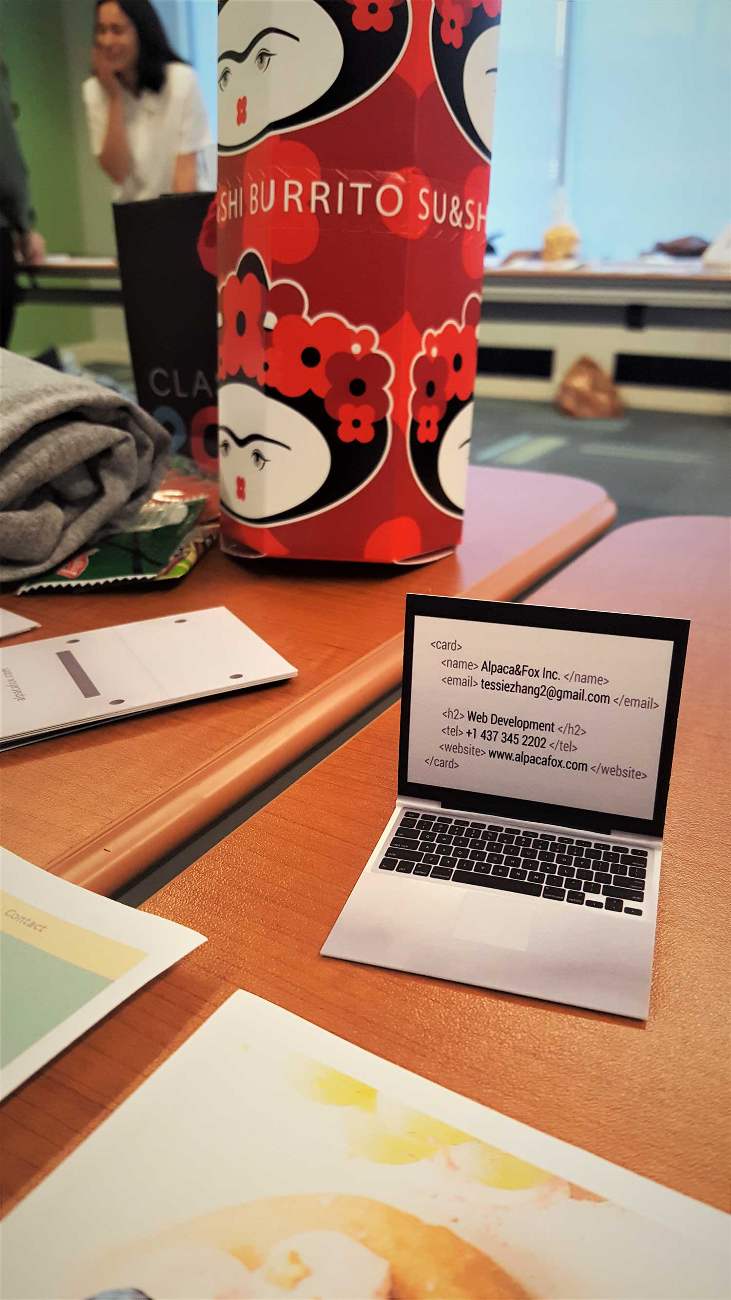 A business card that looks like a macbook