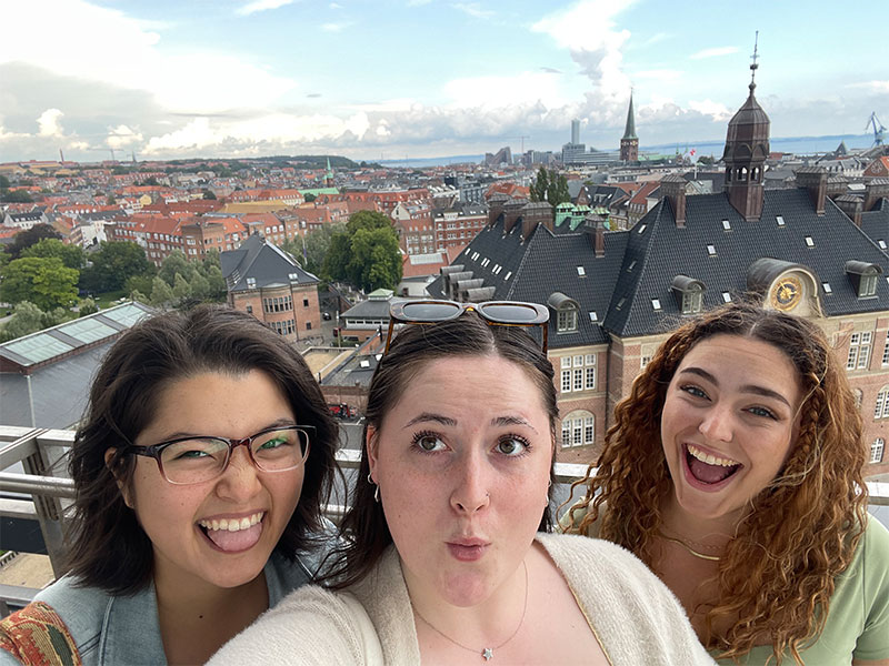 Three People posing for Photo