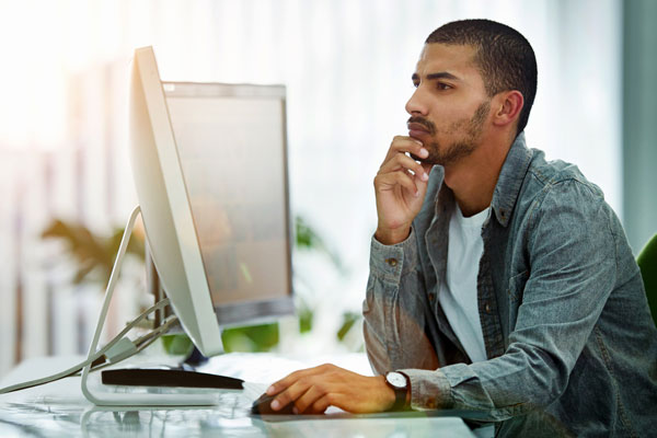 person using desktop computer