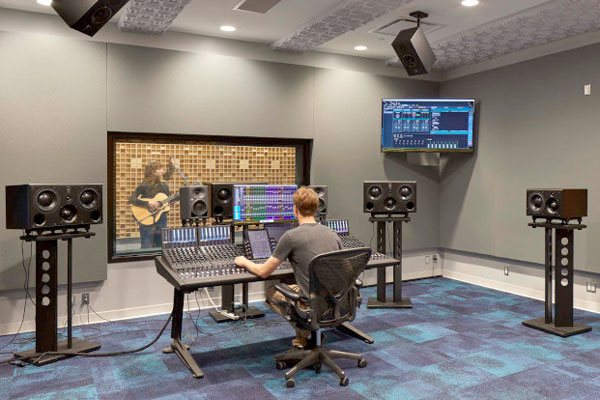 Guitar player in recording studio