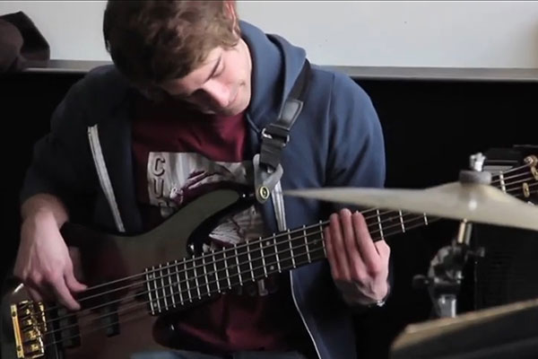 student playing guitar