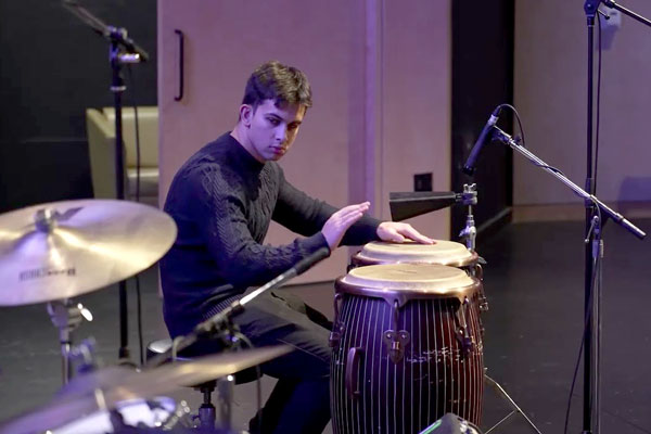 Performer playing drums