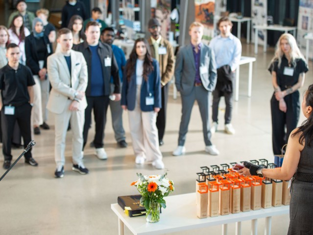 Group of Industrial Design students watching presenter