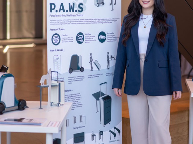 Bianca Fraser stands beside her project poster