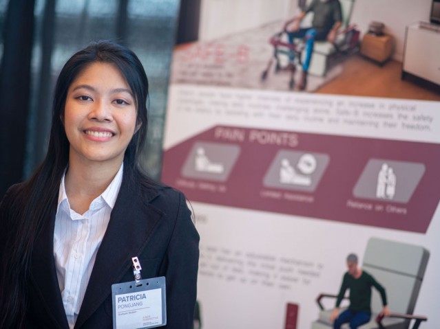 Patricia Pongjang poses in front of her project poster