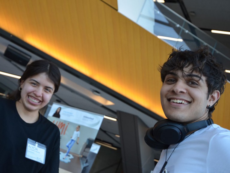 Two people smiling for camera