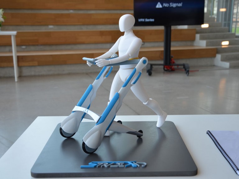 Physical 3D model of figure walking with mobility device