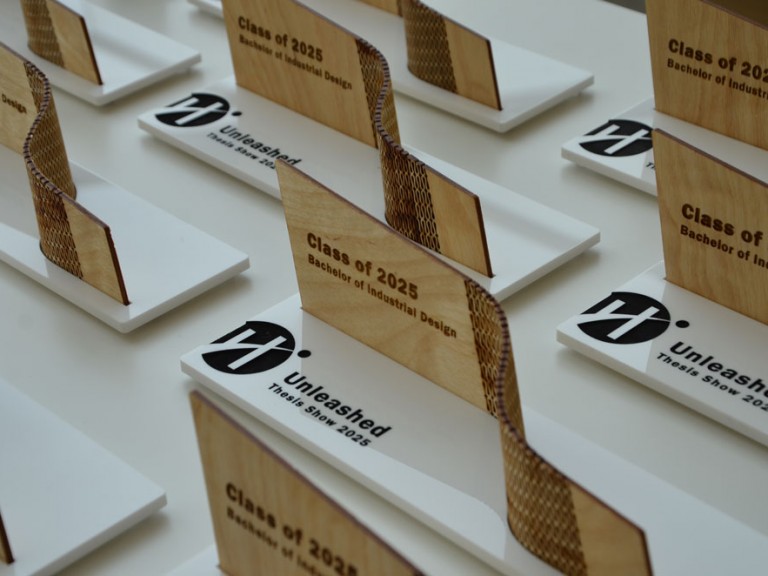 Class of 2025 Bachelor of Industrial design awards on table