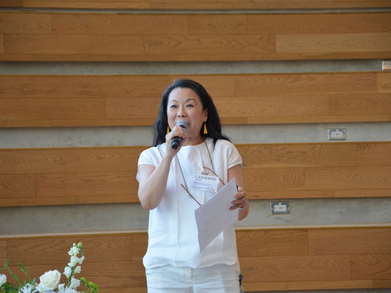 Person speaking into microphone