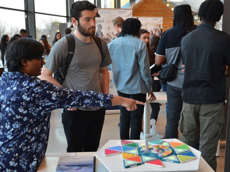 Person pointing at their project model