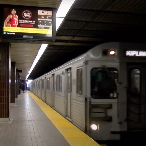 Subway train with Kipling sign on front