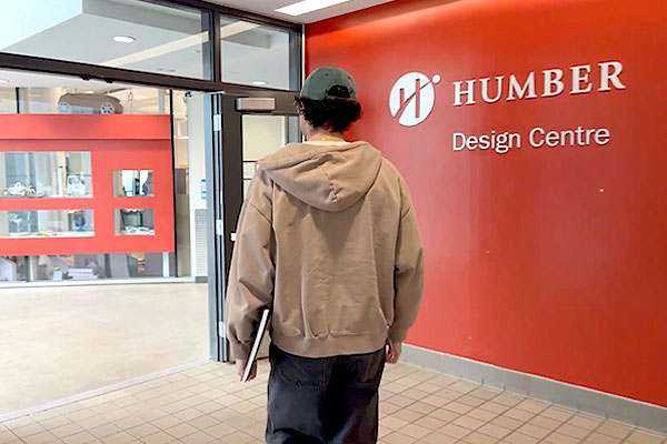 Person walking through Humber campus design centre