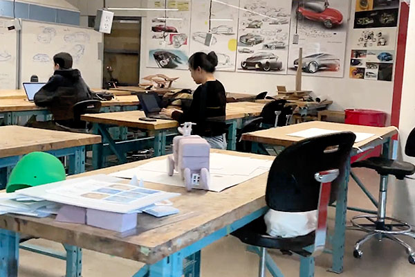 Two students working inside classroom